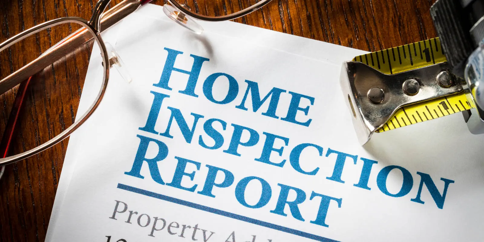 Home inspection report page on desk